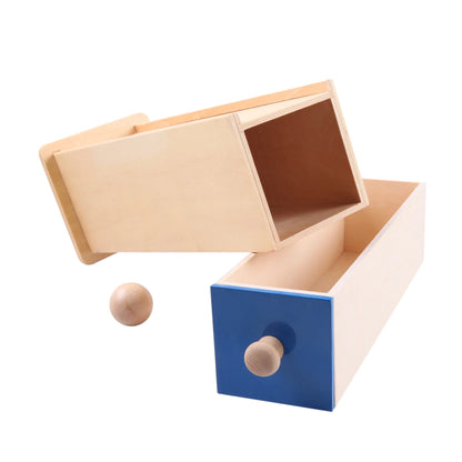 Caja con cajón largo azul y pelota