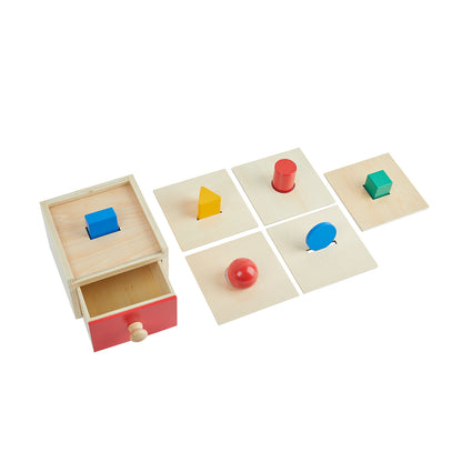 Caja con cajón con tapas intercambiables y cuerpos geométricos (escuela)
