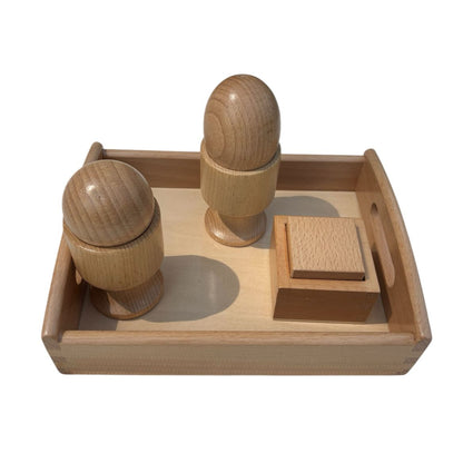 Charola con ovoide, esfera y cubo con base